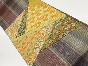 すくい織切り嵌め金彩縞に草花・古典柄模様織出し袋帯